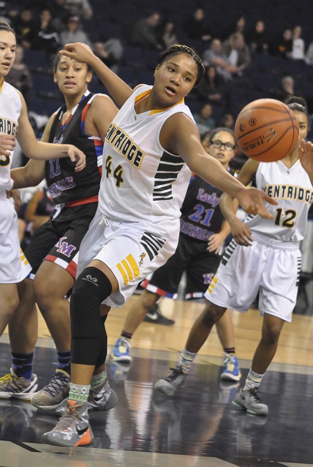 Kentridge's JaQuaya Miller reaches for a loose ball during SPSL play against Kent-Meridian at the ShoWare Center on Thursday.