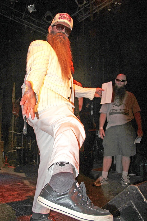 Kent native Patrick Dawson competes in the Emerald City Beardo’s Facial Hair Club Northwest Regional Beard and 'Stache Competition last Saturday at Studio Seven in Seattle.