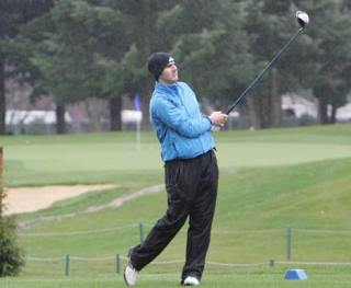 Kent Parks Director Jeff Watling  tees off on the ninth hole at Riverbend Golf Complex. The newly redesigned course will be the site of a free golf day for all ages April 18.