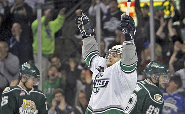 Branden Troock celebrates after scoring a goal during the Thunderbirds' first-round playoff series-clinching Game 5 win over Everett.