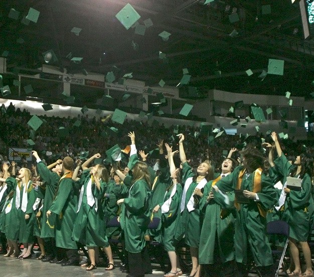 Kentridge High students celebrate their graduation last June at the ShoWare Center. Numerous graduation ceremonies are scheduled over the next two weeks at the Kent arena.