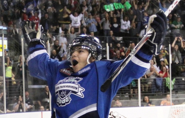 Roberts Lipsbergs celebrates as the T-Birds took down rival Portland on opening night. Lipsbergs had two goals in a 4-3 shootout win Saturday at the ShoWare Center.