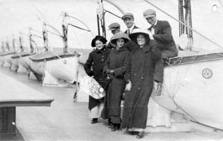 A day in history This happy troupe of tourists enjoys a ship ride to Alaska