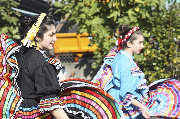 Folklore Mexicano Tonantzin dancers perform in the sunshine during the grand opening Monday of Centro Rendu