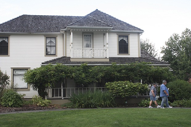 Visitors tour the Neely-Soames Historic Homestead during its annual open house last year. The Homestead hugs the Green River Trail. The public can tour the grounds and get a glimpse of the way residents lived in 1885 with a tour Saturday