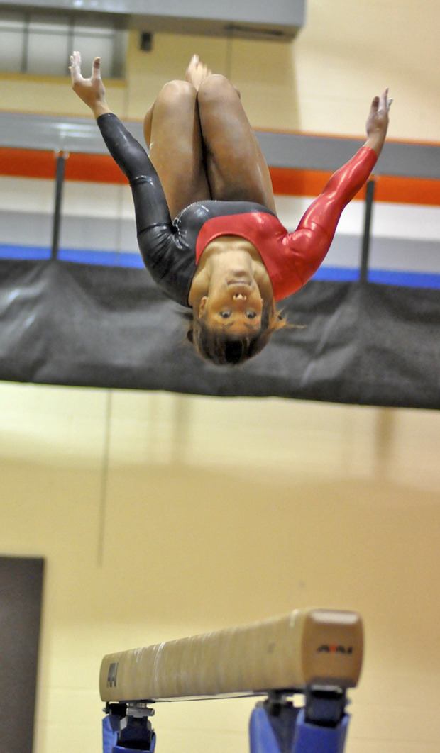 Kentlake's Ashley Pernell takes flight in a meet at Auburn Mountainview.