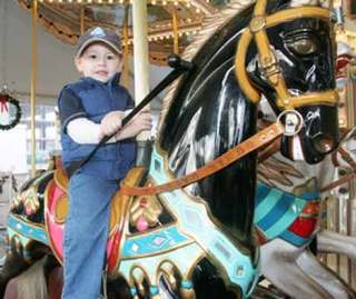 Brandon Danielson rides the Morford Family Carousel during a past Winterfest.