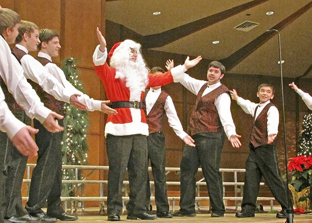 Kent’s Rainier Youth Choirs holiday concert on Saturday collected 210 items and $102 for the Kent Food Bank.