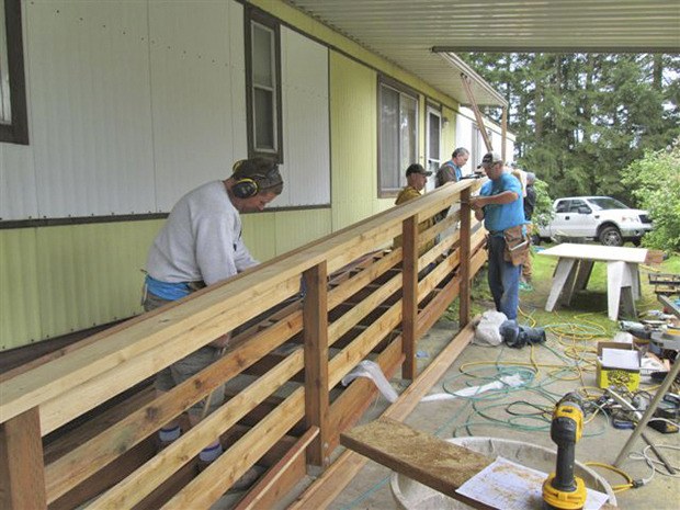 Volunteers from the Master Builders Care Foundation built a new ramp for Kent's Maureen Gladstone.