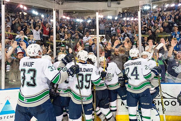 Players join the fans in celebrating the Thunderbirds' Western Conference title-clinching win over the Rockets on Wednesday. Seattle heads to the WHL finals for the first time since 1997.