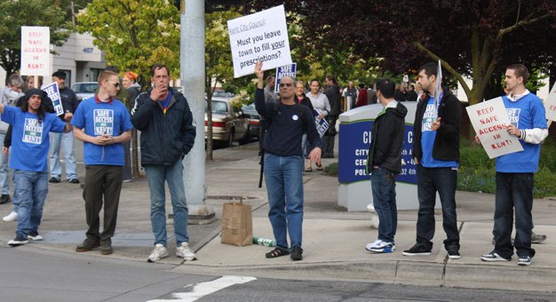 Protesters march in June 2012 to oppose a city of Kent ban against medical marijuana. The City Council has since passed a ban on recreational marijuana businesses.