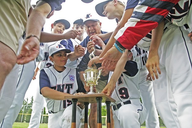 Coach Curt McGuire talks to his team after the championship game of the District 10 tournament