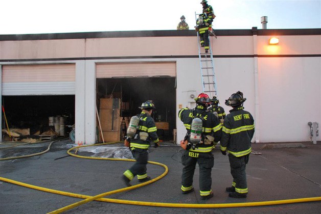 Kent firefighters on the scene of two unit fire.