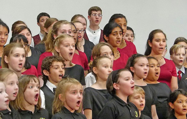 Combined Rainier Youth Choirs perform during their season finale at the May 30 Out of the Blue concert.