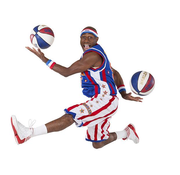 Firefly Fisher of the Harlem Globetrotters visits East Hill Elementary School on Wednesday.