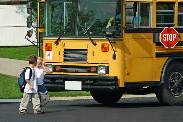 Drivers are reminded to be alert for school buses as kids head back to class.