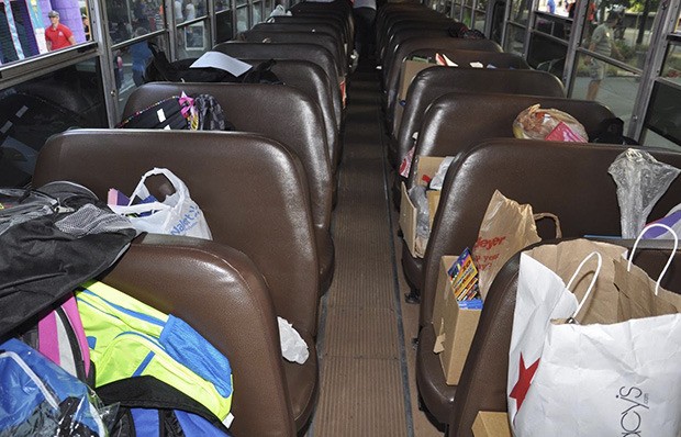 Community donations helped fill a bus at the third annual SOAKS – Summer’s (Almost) Over At Kent Station – event on Aug. 20.