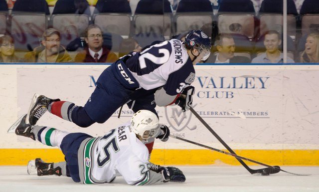 The Thunderbirds' Ethan Bear battles the Americans' Devon McAndrews during WHL action Friday night at the ShoWare Center.