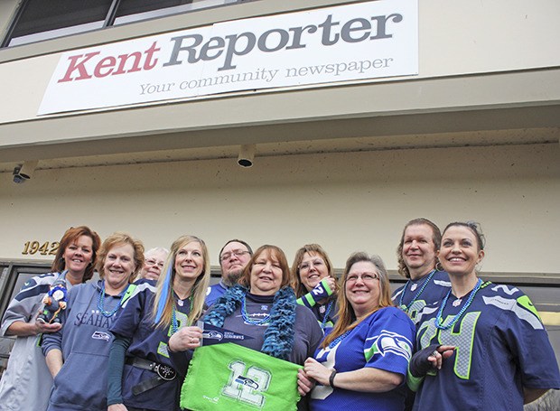 Reporter staff show their Seahawks pride on Blue Friday.