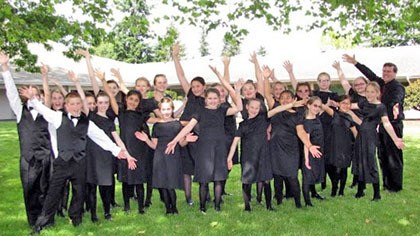 Bella Voce singers warm up for the Rainier Youth Choirs' May 30 Out of the Blue concert.