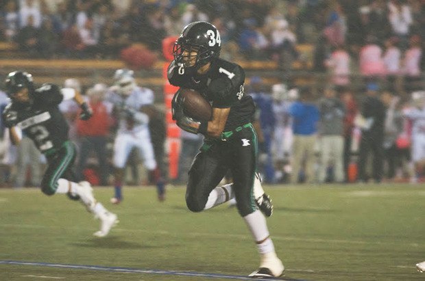 Junior running back Isaiah Williams picks up another first down for Kentwood.