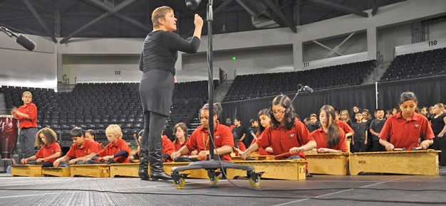 The Neely-O'Brien Elementary D.R.U.M Band and Red Hawk Singers perform at the 2013 You Me We festival at the ShoWare Center. The event returns on Jan. 24.