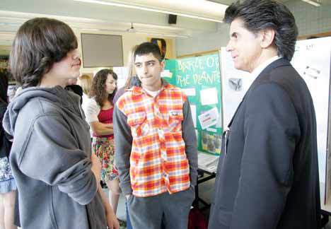 Kent Superintendent Edward Lee Vargas talks with Dallas Larry