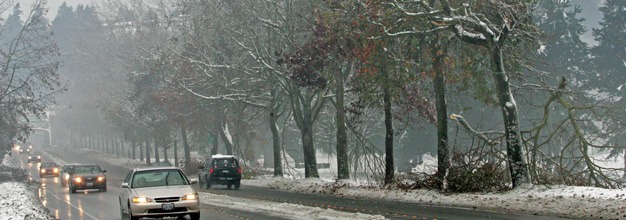 Drivers head along West Meeker Street during a January 2012 storm.