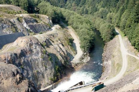 Water is released into the Green River from behind the Howard Hanson Dam during a media tour last fall. The U.S. Army Corps of Engineers will release extra water May 12-15 to lower the reservoir.