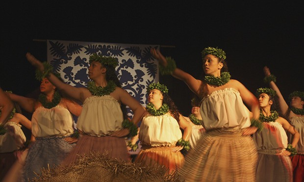 The Ke`ala `O Kamailelauli`ili`i hula group dances at the final Artist and Speaker Series at Green River Community College.