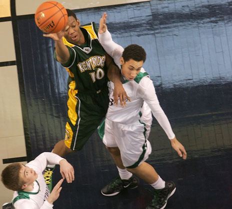 Kentridge's Jawan Stepney hits a short jumper over Kentwood's Taylor Jones last year at the ShoWare Center. Kentridge plays Kent-Meridian at 7:30 p.m. Jan. 21 in the King Showcase at the ShoWare.