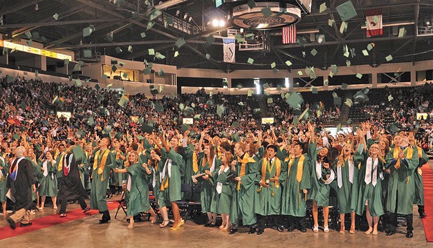 Kentridge High School class of 2013 graduates celebrate last year at the ShoWare Center.