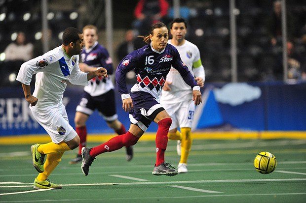 The Stars' Joseph Cairel dribbles the ball up the field against the Sockers during MASL play Sunday at the ShoWare Center.