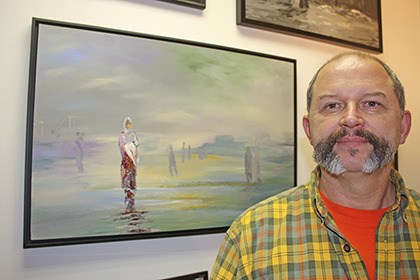 Savant artist Michael Tolleson operates a studio and autistic art mentoring center in the Kent Business Center at 25524 74th Ave S.