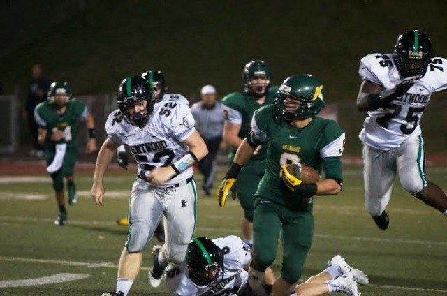 Kentridge's Carter Johnson tries to break free from the Kentwood defense.