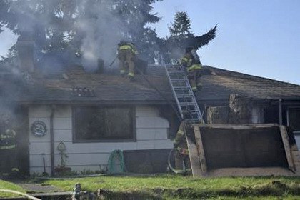 Firefighters responded to a house fire in the 20100 block of 13 Avenue South in SeaTac on Tuesday. The home has burned for the second time in a month.