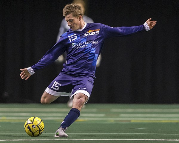 Tacoma Stars striker Mark Lee prepares to kick the ball during a recent match. The Stars head to Missouri for a two-game road trip this weekend.