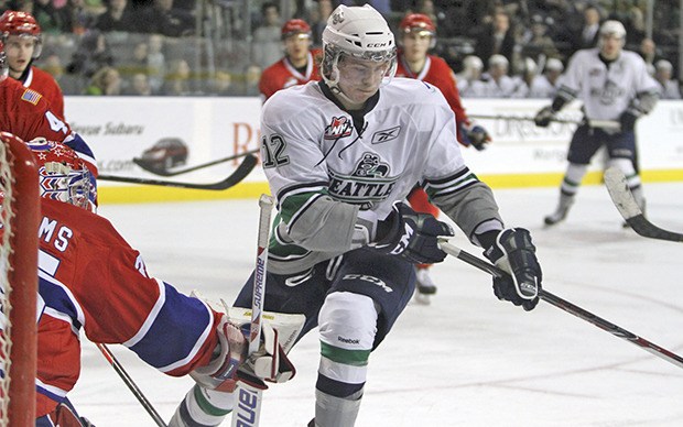 The T-Birds' Ryan Gropp scores a goal during a 6-4 home loss to Spokane on Tuesday. Seattle will open playoff action next week. Tickets go on sale Monday.