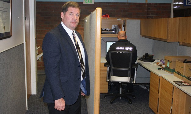 Chief Ken Thomas stands near a portion of a hallway converted to an office at the Kent Police station. The City Council referred a measure on Tuesday to ask voters in November to approve a bond for a new police headquarters.