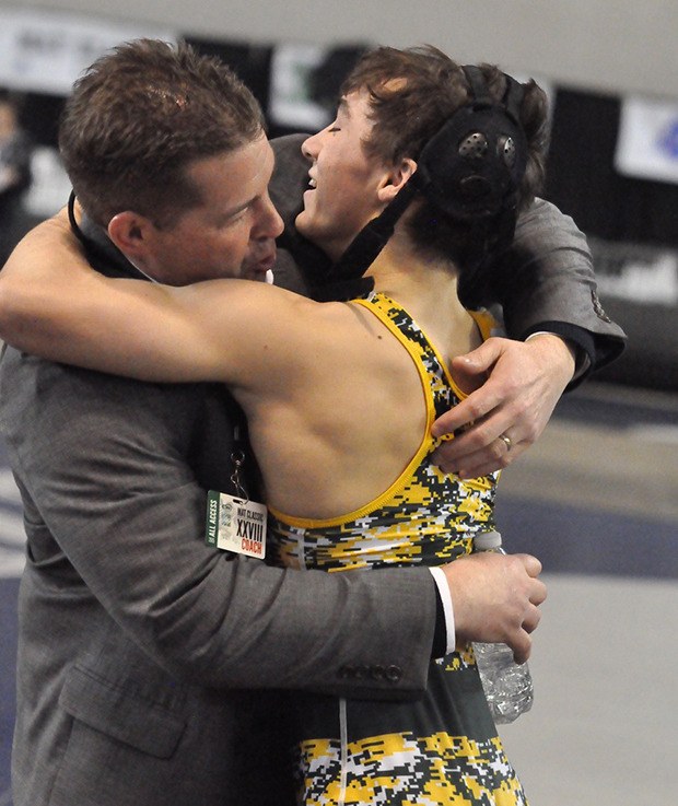 Kentridge's Derek Freitag hugs his coach