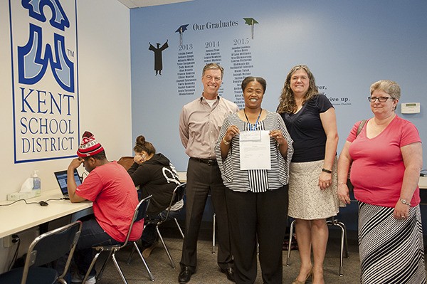 The Kent Schools Foundation recently presented iGrad with a $500 grant to help for transportation. From left