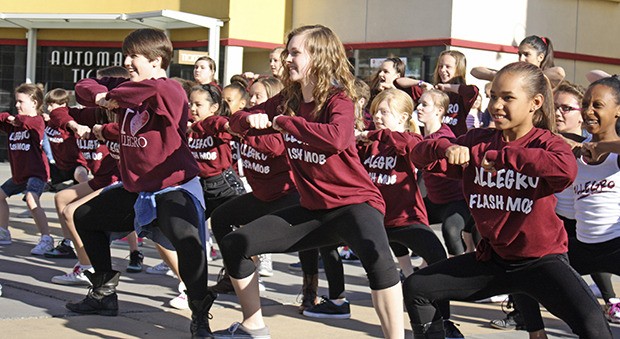 Dancers perform during the Allegro Performing Arts Academy’s first flash mob at Kent Station last year. Fifty Allegro students ages 6-16 performed in honor of National Dance Week.