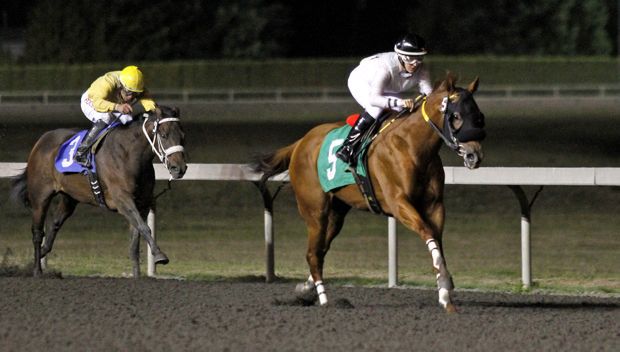 Lake Piru and jockey Anne Sanguinetti are clear to the wire in the feature race for 3-year-old fillies at Emerald Downs.