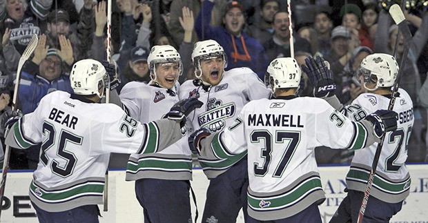 T-Bird players celebrate a goal during their series-winning play against Everett last season. Seattle opens its WHL home slate against the Silvertips on Sept. 20.