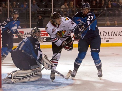 Portland's Presten Kopeck gets in front of the goal as a shot flies by Thunderbird Evan Wardley