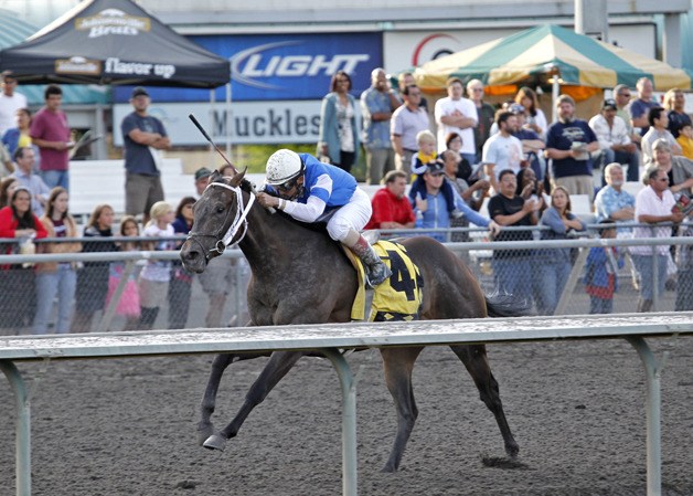 Ron and Rosalie Warren's Jebrica powers to victory in the $65