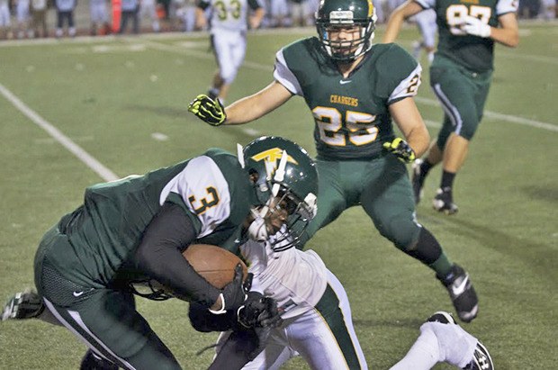 Kentridge's Malik McFerrin fights for yardage against the Auburn defense.