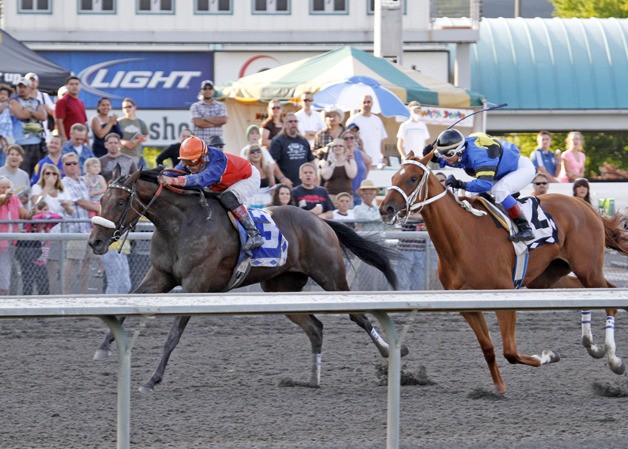 Sweet Saga rallies to the lead in the Barbara Shinpoch Stakes at Emerald Downs.