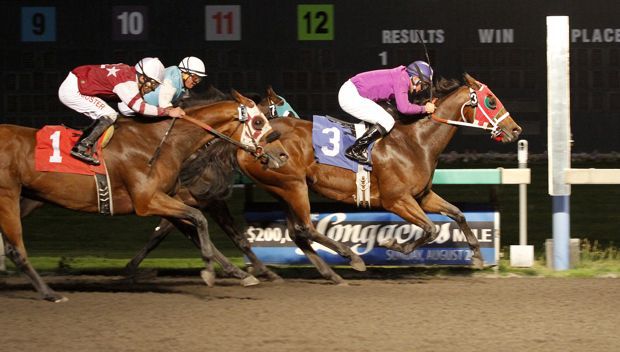 Star of the Dia prevails by a half-length in Friday's feature race for 3-year-olds and up at Emerald Downs. Isaias Enriquez was up for trainer Frank Lucarelli.