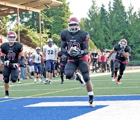 Kentlake's Austin Pernell goes in from 11 yards out